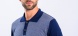 Blue knitted polo shirt with grey pattern